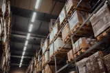 Cardboard cartons on warehouse shelving